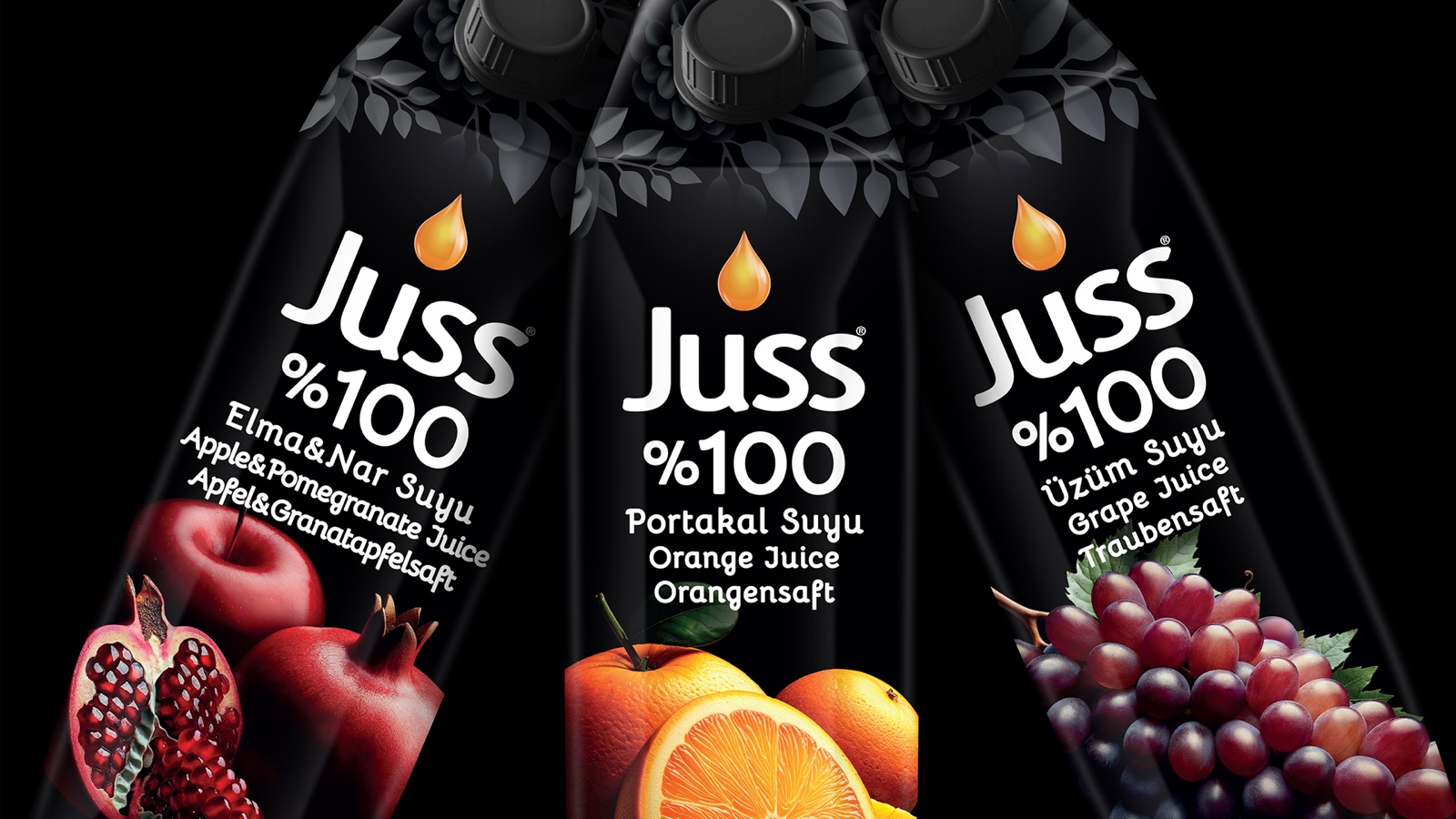 JUSS pack detail — fruit imagery against the brand black